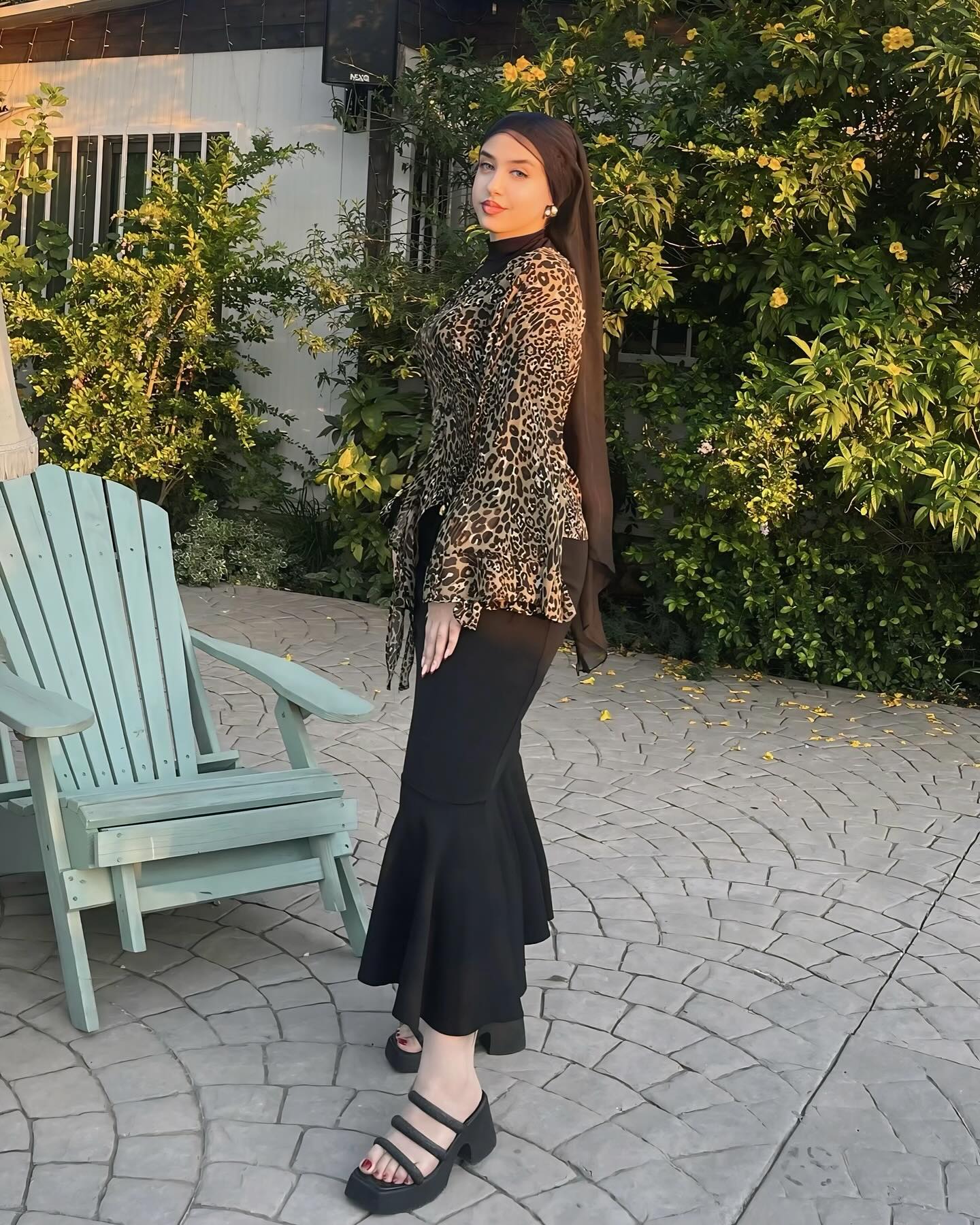 Image of R Y M  |  ريم 💎 from Instagram leopard print, black skirt, sandals, hijab, outdoor, evening wear