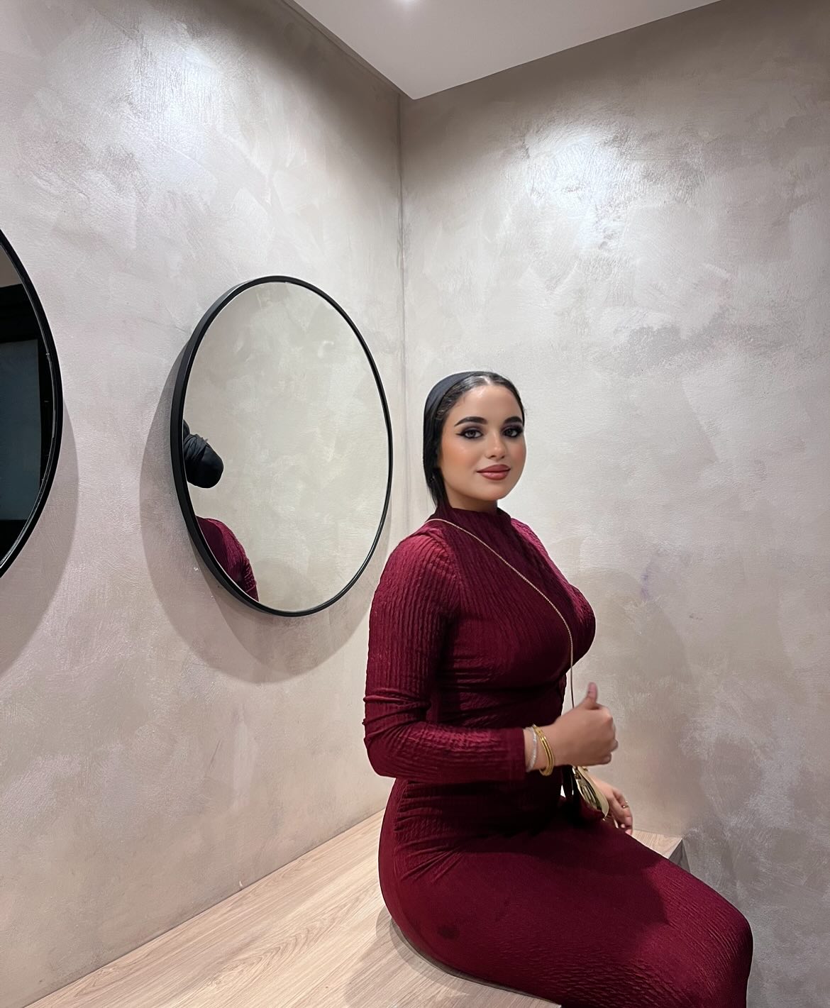 Image of كارلا مصطفي |carla mostafa ✨ from Instagram burgundy dress, long sleeves, bracelets, minimalist style, mirrored space