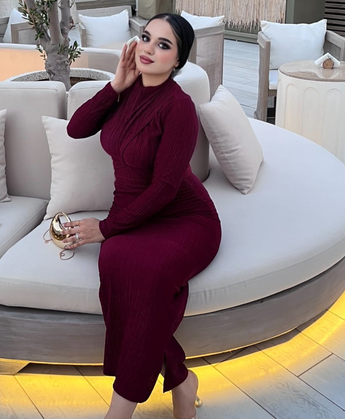 Image of كارلا مصطفي |carla mostafa ✨ from Instagram burgundy dress, gold clutch, heels, outdoor setting