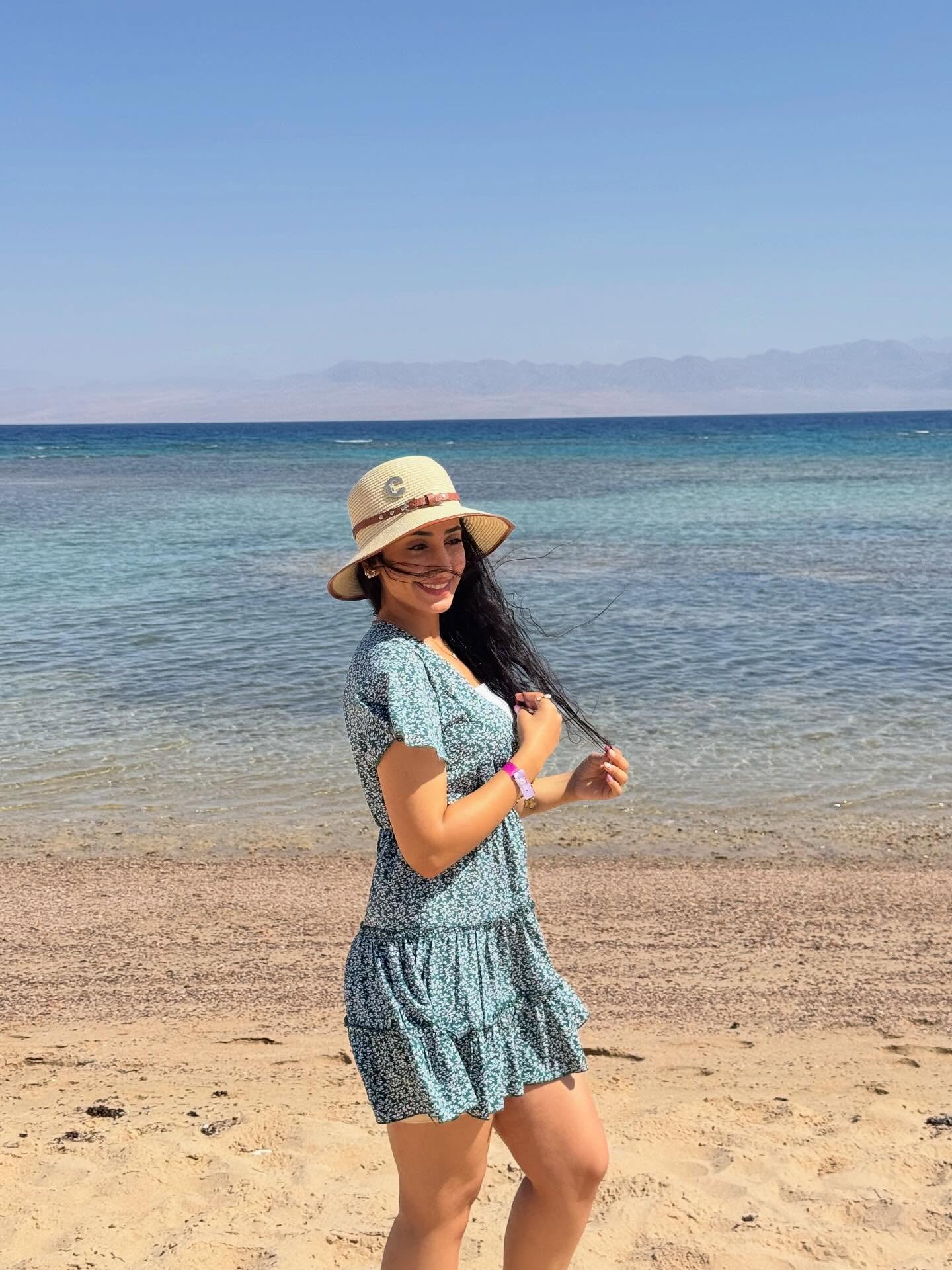 Image of سماره🦋 from Instagram hat, summer dress, beach, barefoot, sea
