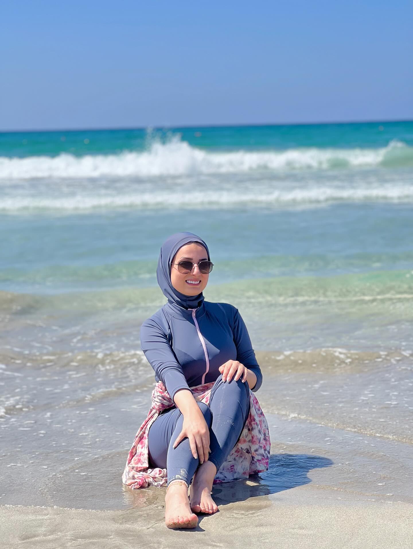 Image of عليا 🇱🇧 from Instagram beachwear, burkini, hijab, sunglasses, floral, barefoot, beach