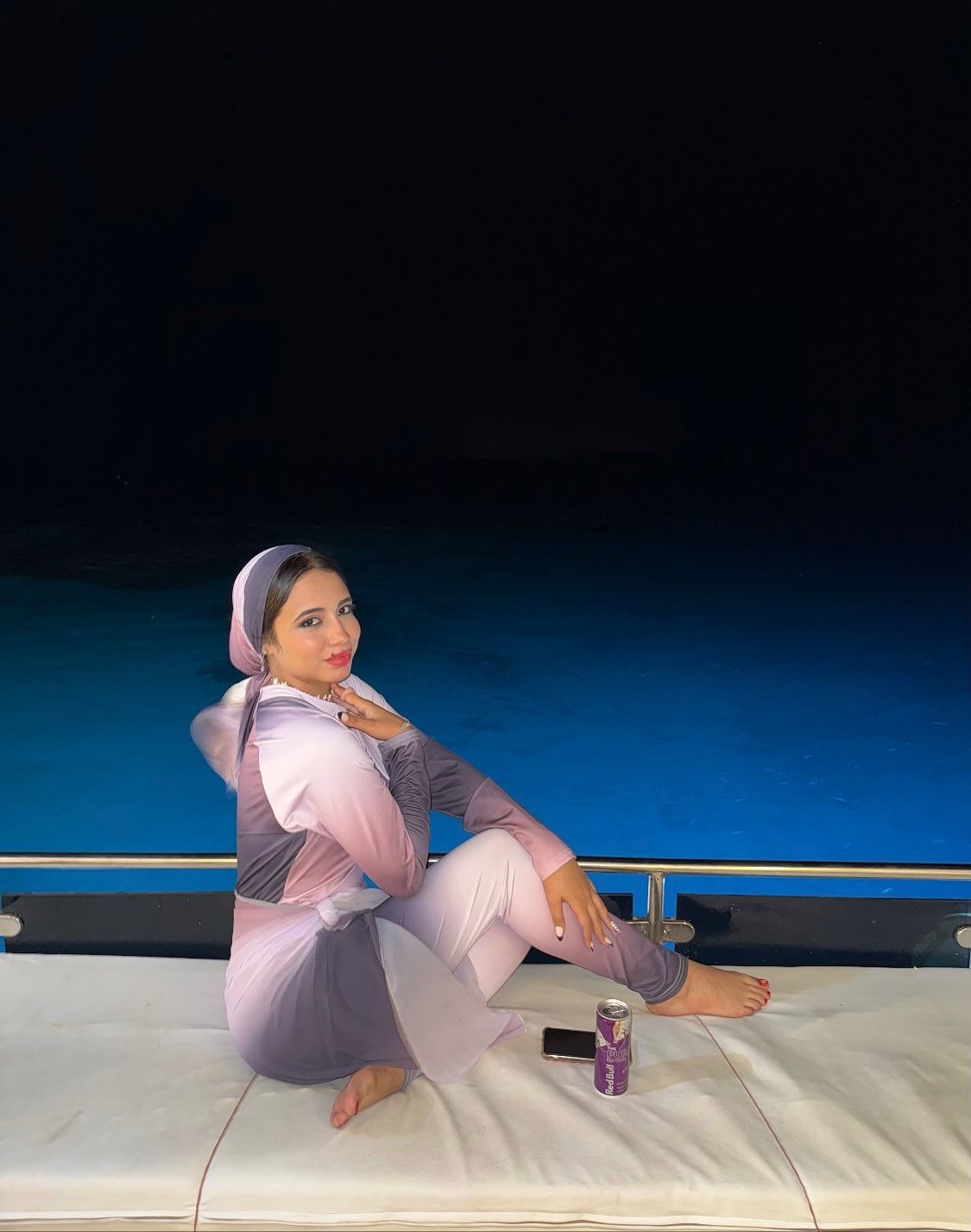 Image of Hoda Hassan from Instagram hijab, dress, ombre, barefoot, boat, night