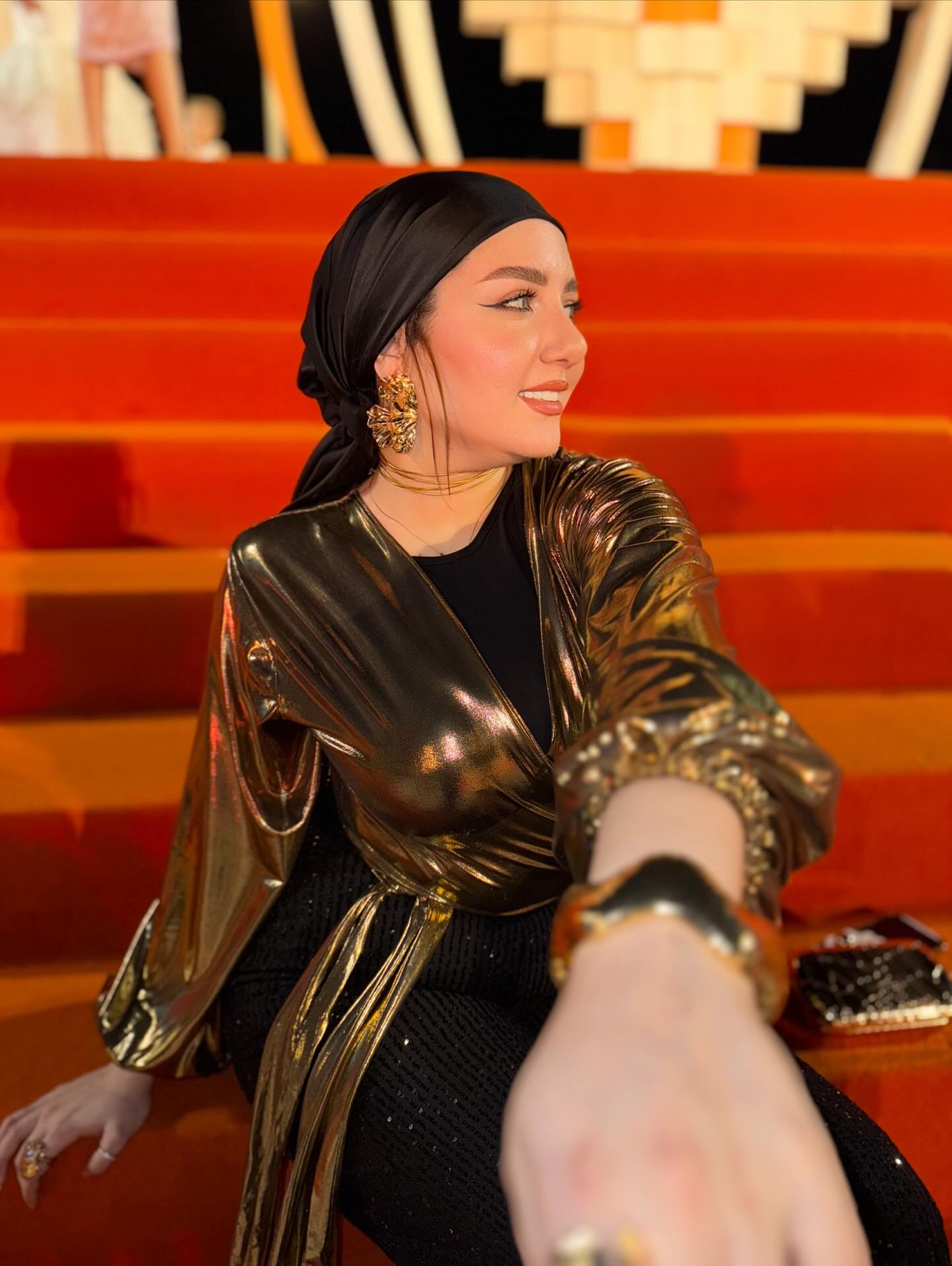 Image of makeup by merna t3ima from Instagram metallic, gold, headscarf, earrings, bracelet, ring, clutch, formal, red carpet