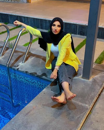 Photo by Heyam Yaseen on June 01, 2024. May be an image of 1 person, headscarf, turban, pool and outdoors.